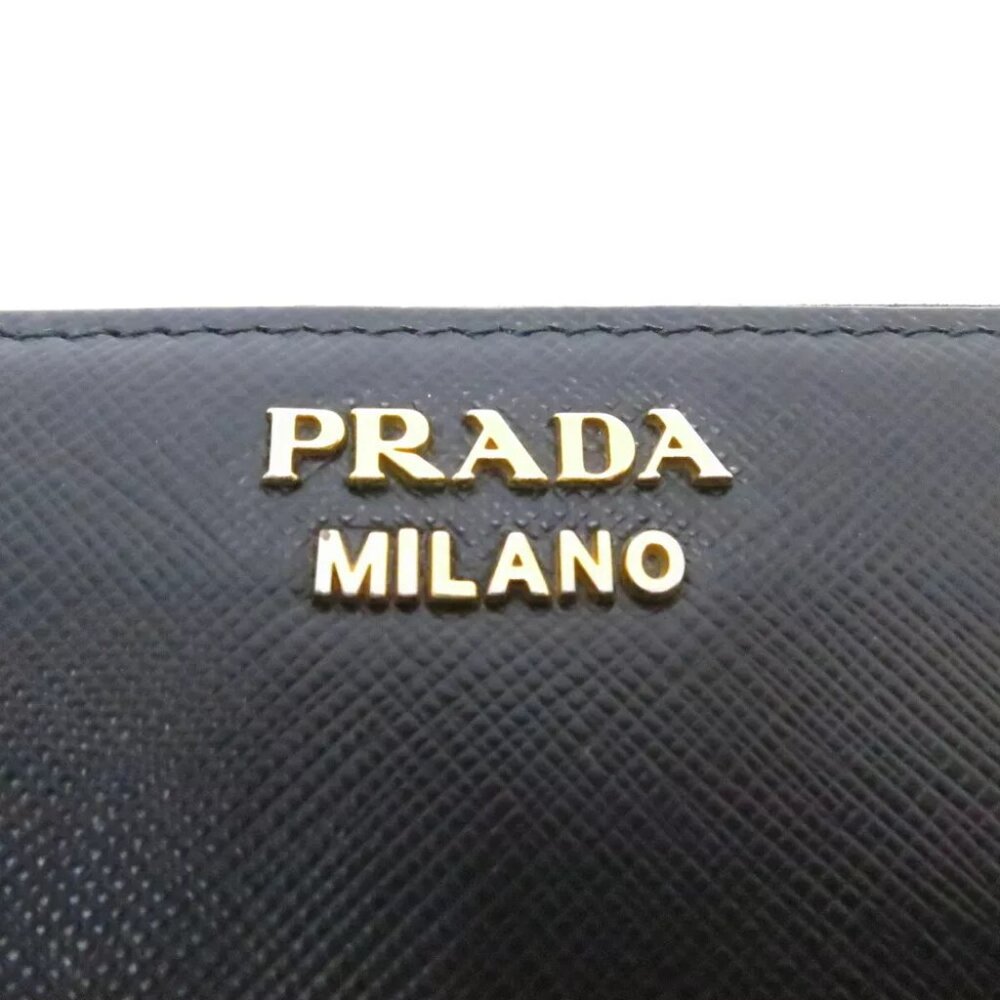 PRADA Saffiano Triang Zippy Round Wallet Black - Picture 12 of 12